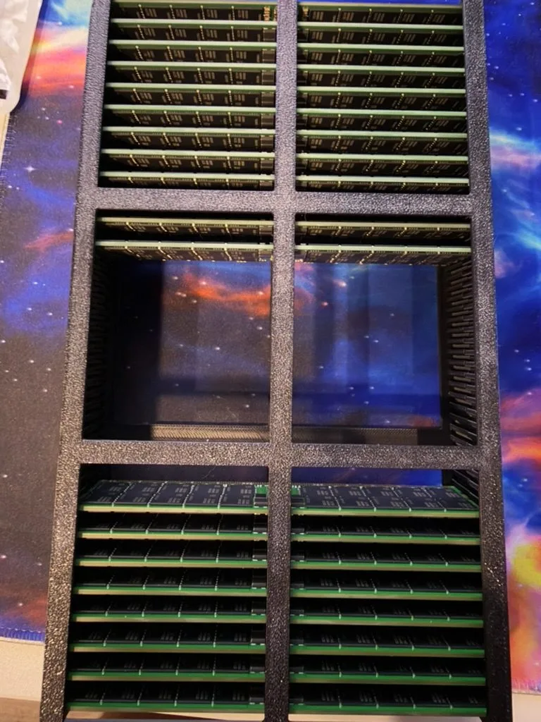 Modules stored in a slotted rack between testing and shipping.
