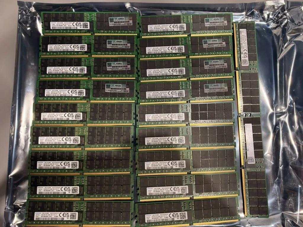 A full tray of 64GB modules laid out on anti-static film before listing.