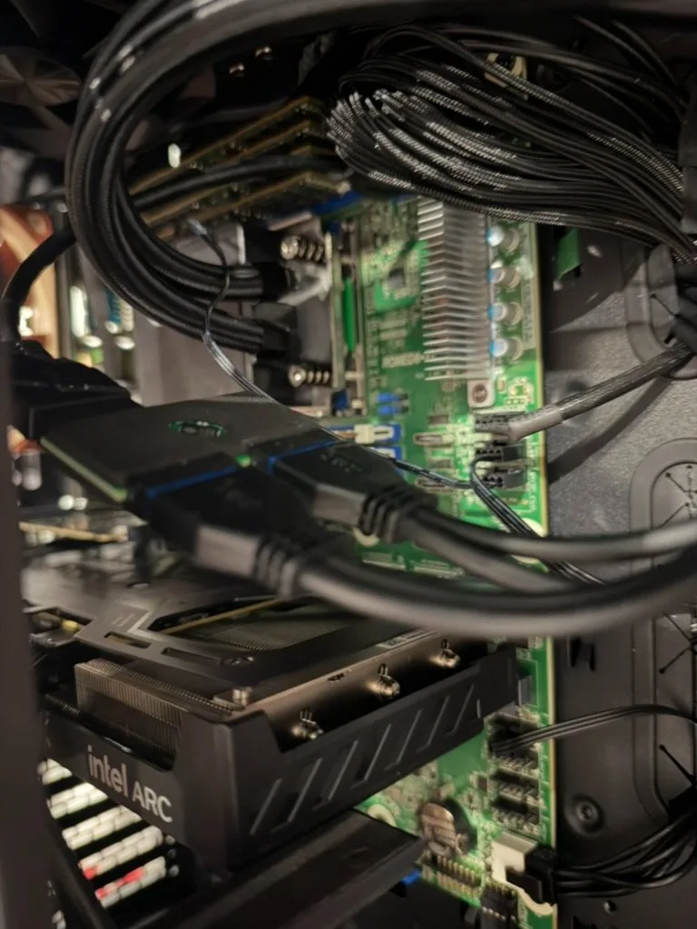 ASRock Rack ROMED8-2T with the Intel Arc B580 installed and cabled.