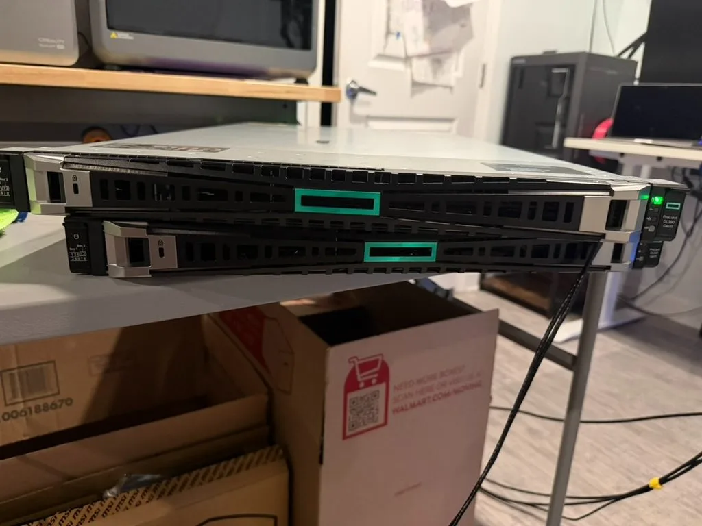 Two ProLiant DL360 Gen11 units with bezels installed.