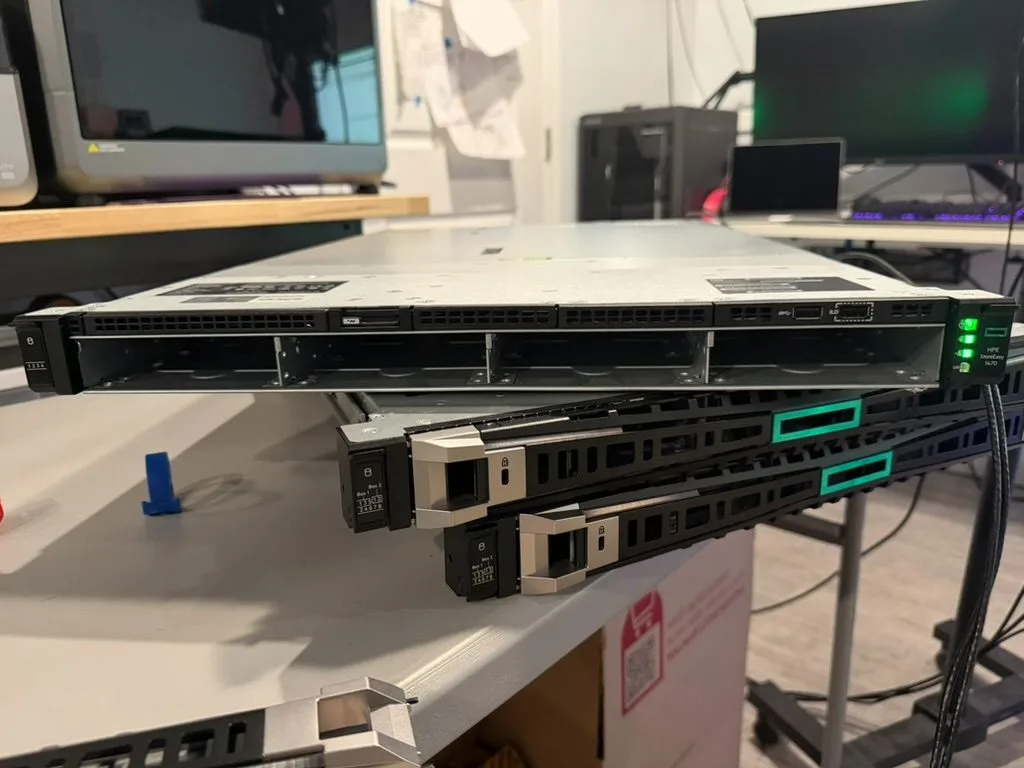 An HPE StoreEasy 1470 with its bezel off, showing the four LFF bays.