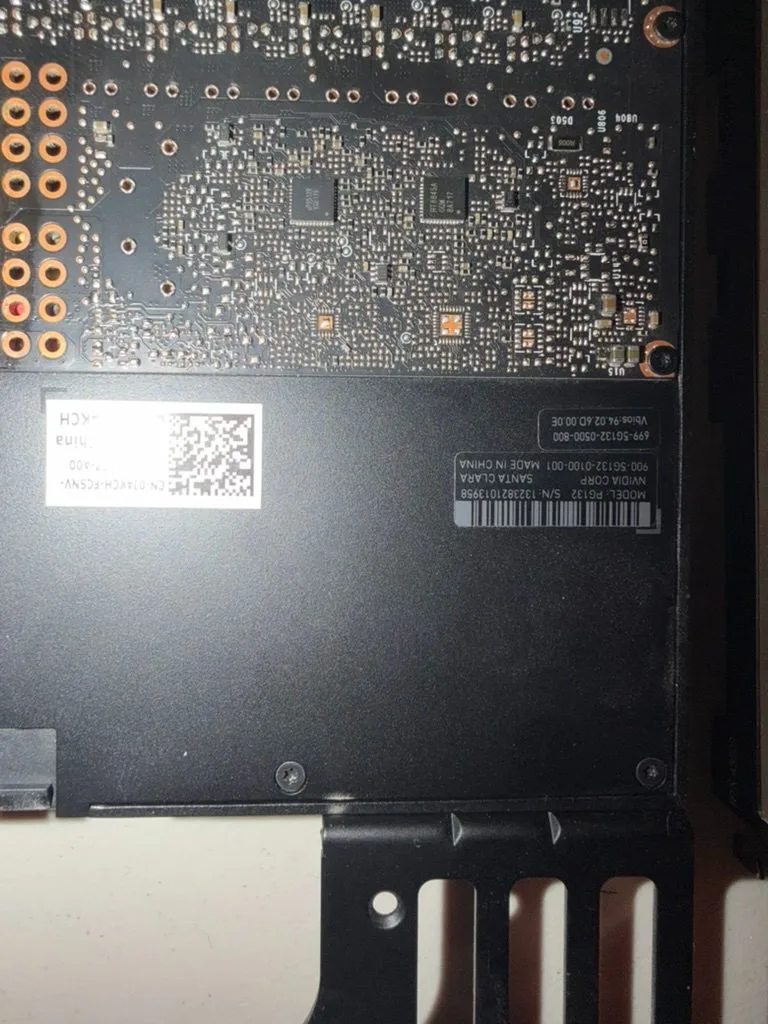 NVIDIA PG132 model label and VBIOS sticker on the back plate.