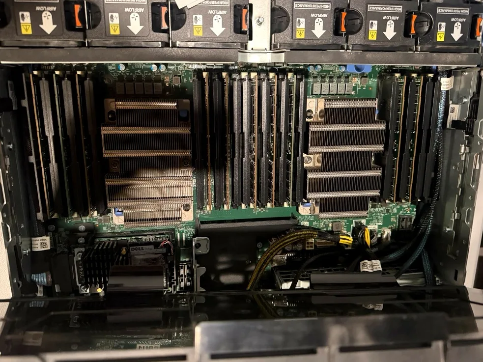 Both CPU heatsinks and the full DIMM banks under the high-performance fan wall.